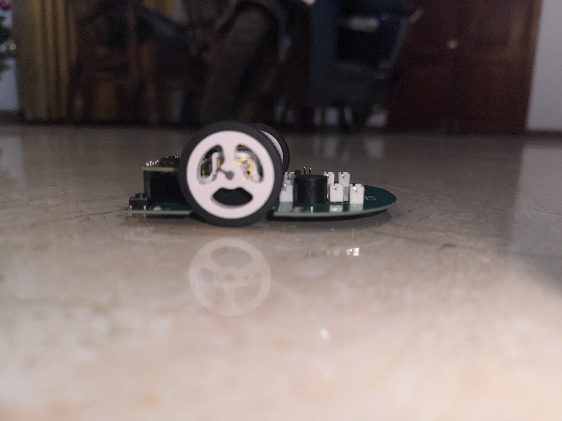 Ground-level view showing wheel and chassis clearance