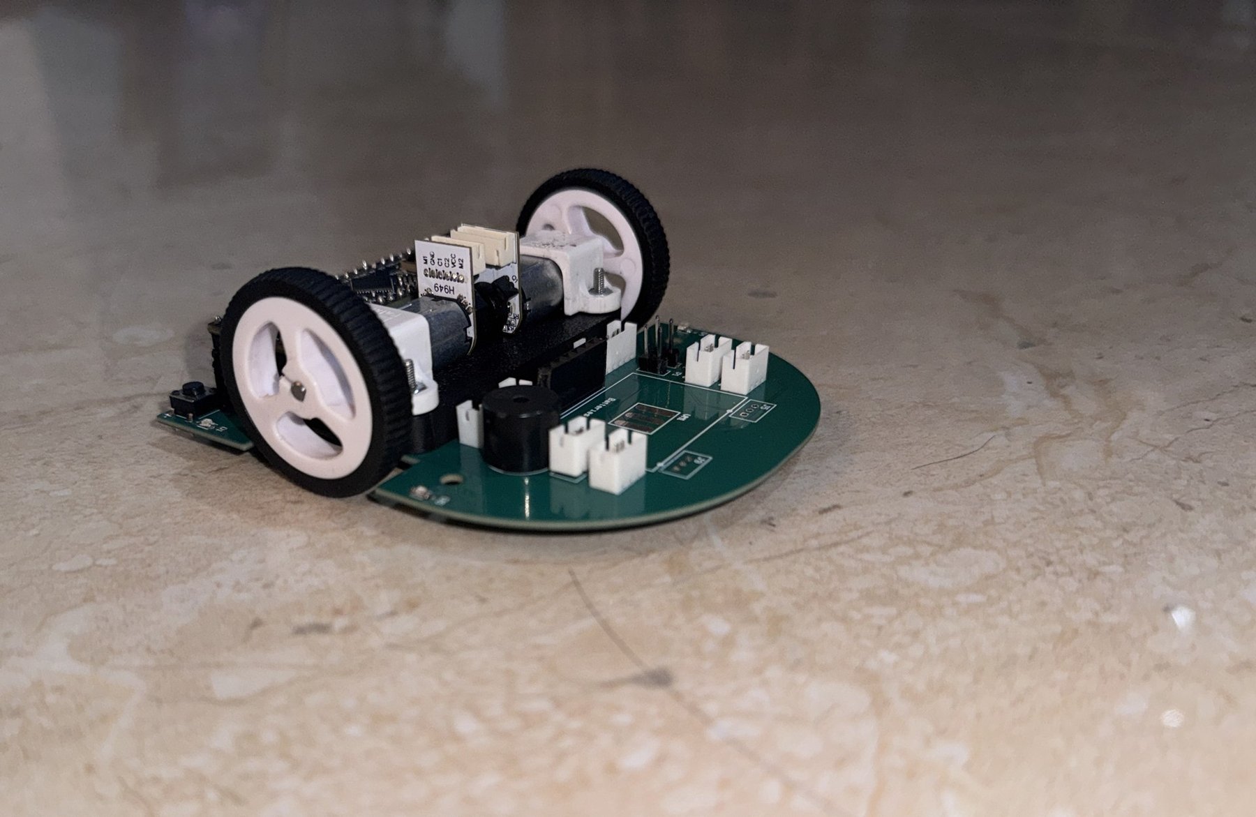 Partially assembled — motors and sensor wiring